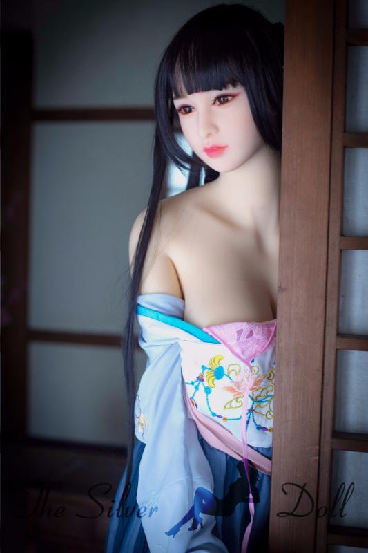 Meifeng desnuda en el templo budista