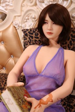 Clotilde in purple dress