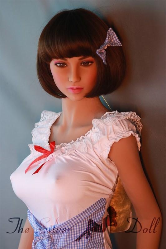 Millie with short brown hair