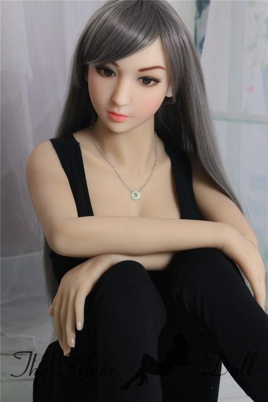 Nishi in black pants