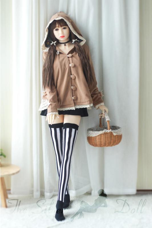 Kumiko in brown coat