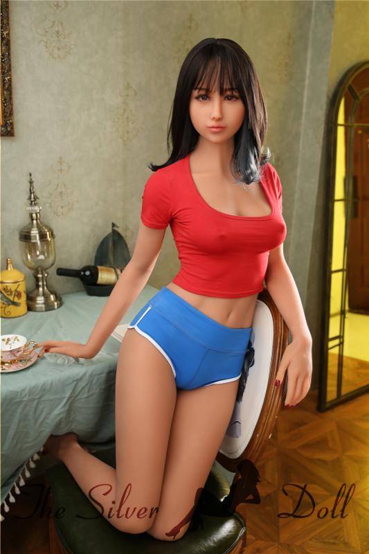 Saya in red top and blue hotpants