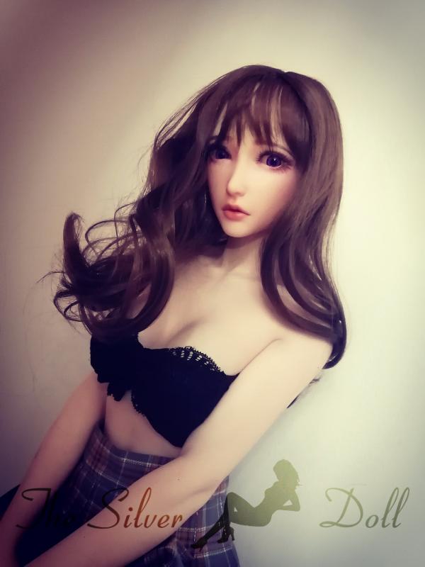 Akiyama Naoko con gonnellino tartan