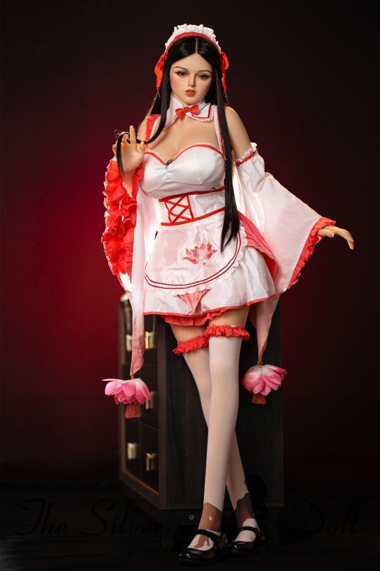 Mya in traditional white and red dress