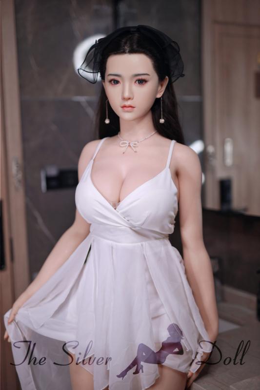 Xiaoqi brunette in white dress