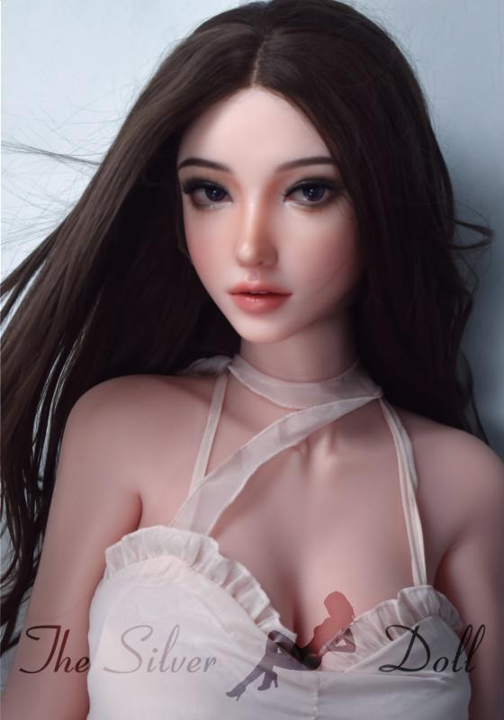 Sakai Kanako in a cream color dress