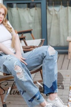 Imogen with ripped jeans