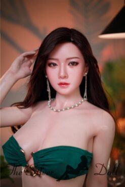 Jie with a green dress