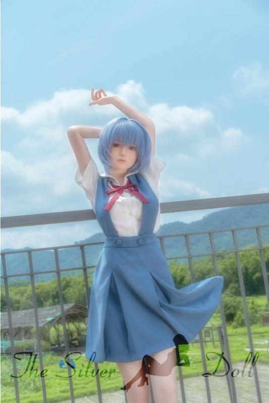 Rei en vestido azul