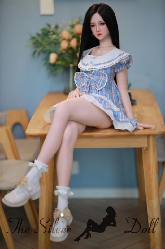 Mini Winnie sitting on a table