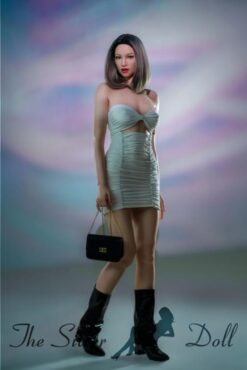 Charlize en vestido cian