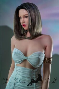 Charlize en vestido cian