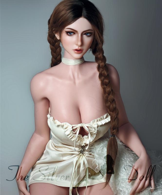 Kat Baccarin with a cream color dress