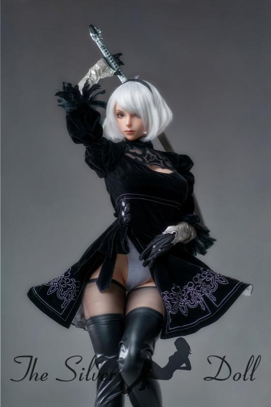 2B in black dress