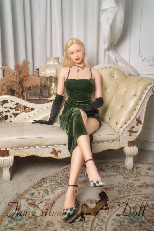 Beatrice in green velvet dress