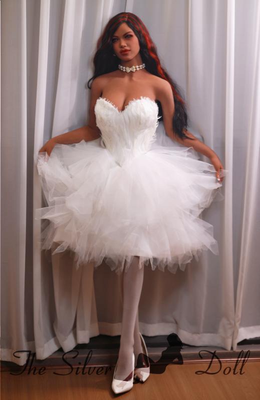 Ella in white ceremonial dress