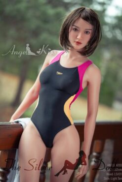 Karla in a one-piece swimsuit