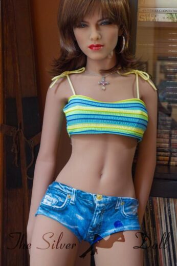 Colleen in striped top and denim shorts