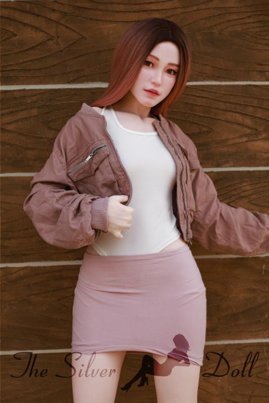 Hannah in white leotard