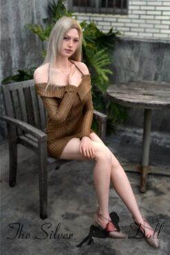 Olivia rubia en vestido marrón