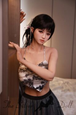 Vivian in gray dress