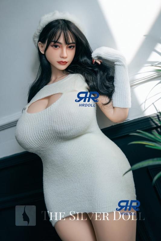 Betsy in light gray tight-fitting dress