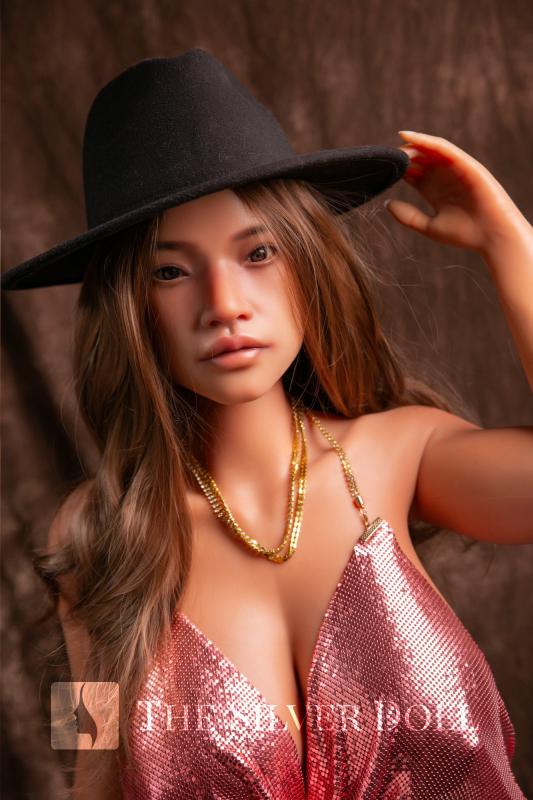 Suri in red sequined dress