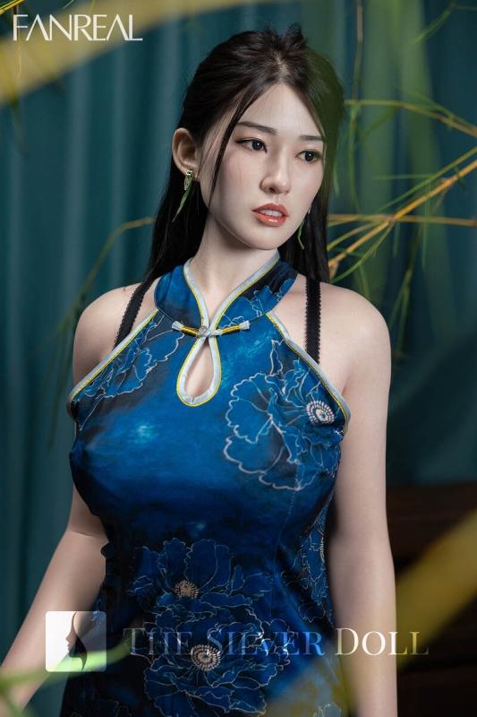 Fei in a blue Chinese dress