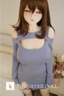 Mion brune en robe grise