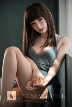 Runa in a sea-green nightdress